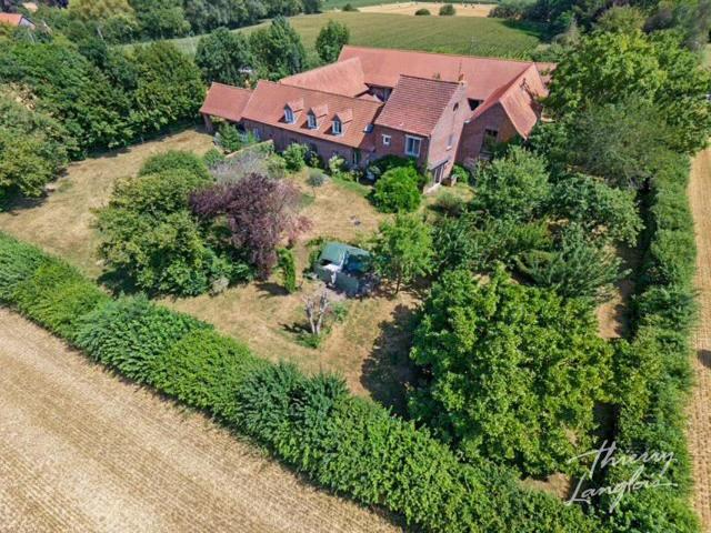 Maison 11 pièces 347 m²