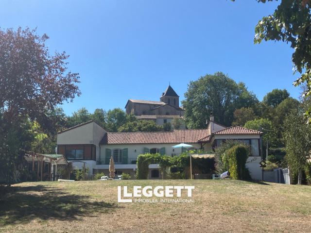Maison 11 pièces 302 m²