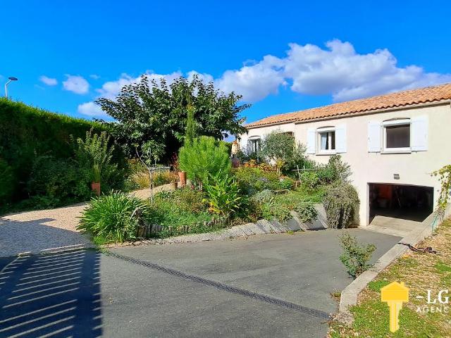 Maison 157m2, belle véranda, jardin et grand garage