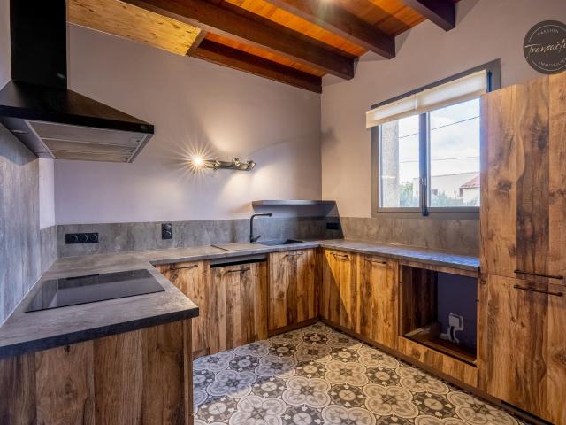 Maison 2 faces pleine de charme avec jardin et double garage !