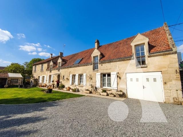 Maison 7 pièces 217 m²