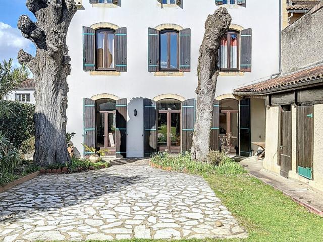 Maison 7 pièces 210 m²