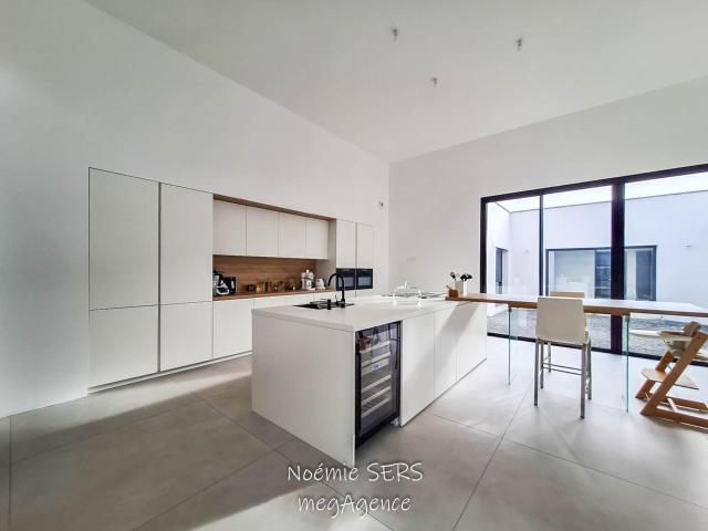 Maison 7 pièces 220 m²