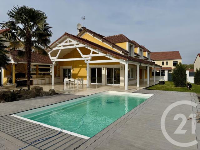 Maison 7 pièces 239 m²