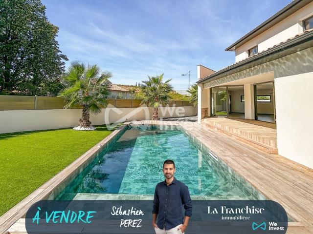 Maison 7 pièces 230 m²