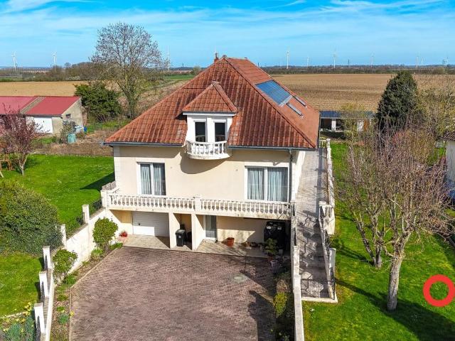 Maison 7 pièces 240 m²