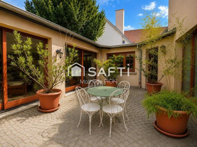 Maison 7 pièces 254 m²