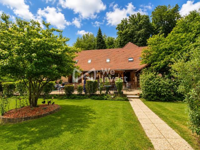 Maison 427 m² en 5 appartements sur près d'un hectare