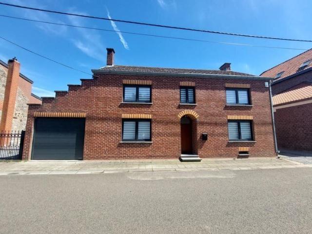 Maison 4 façades avec jardin et garage