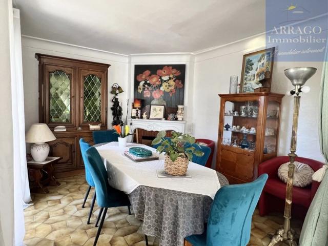 Maison 4 faces avec garage et jardin
