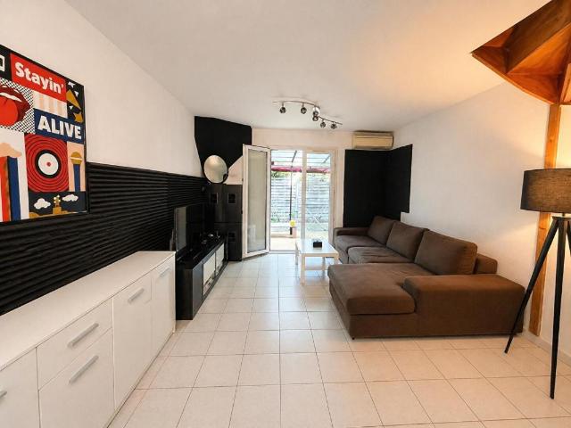 Maison 4 pièces de 77 m² sur une parcelle de 166 m²