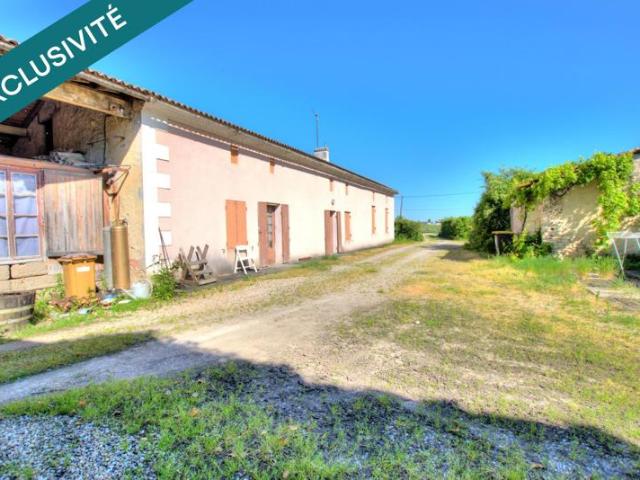 Maison 5 pièces 100m², un chai de 50m², et un hangar de 105m²