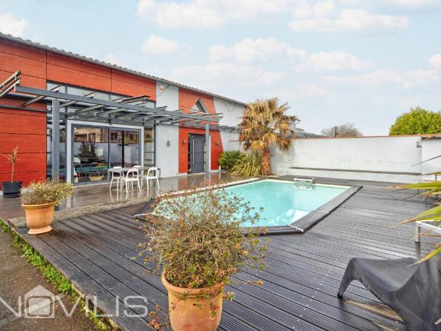 Maison 5 pièces 210 m²