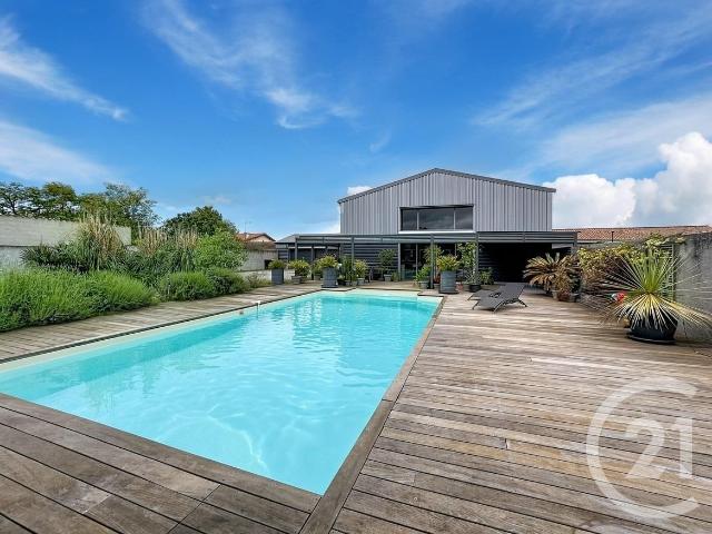 Maison 5 pièces 235 m²
