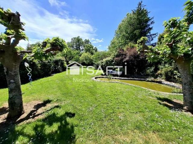 Maison 6 pièces 107m2, 3 chambres, garage et parc paysager