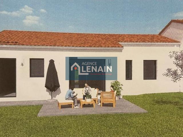 maison 80 m² comprenant salon et coin cuisine aménagée.