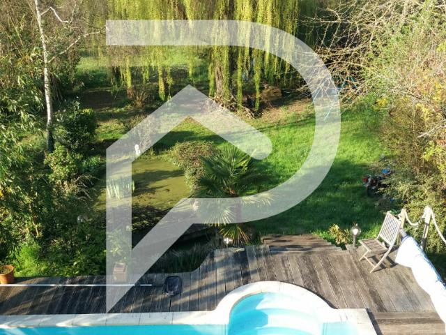 Maison 8 pièces 210 m²