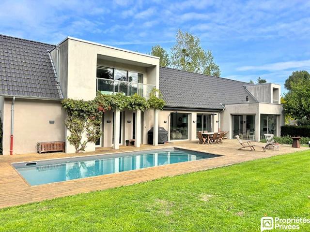 Maison 8 pièces 221 m²