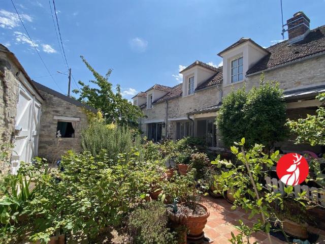 Maison 8 pièces 235 m²