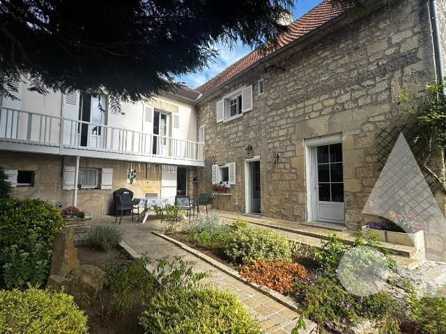 Maison 8 pièces 244 m²