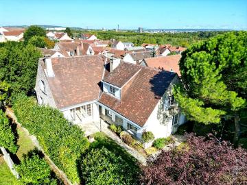 Maison 8 pièces 265 m²