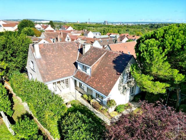 Maison 8 pièces 265 m²