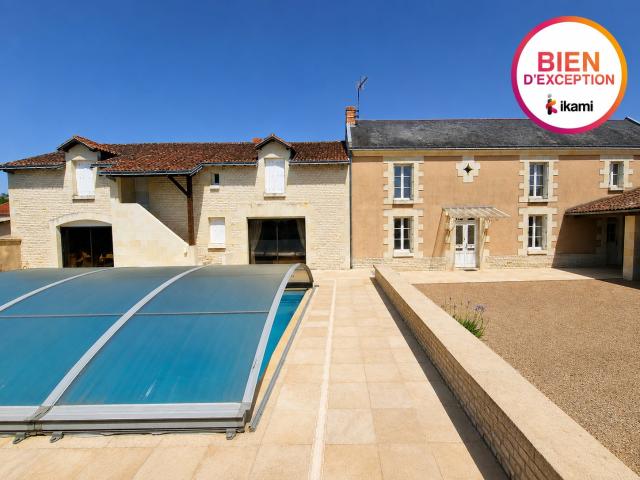 Maison 8 pièces 265 m²