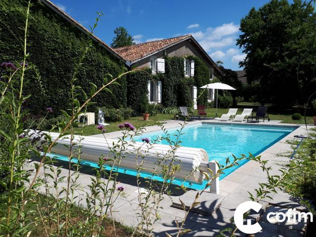 Maison 9 pièces 238 m²