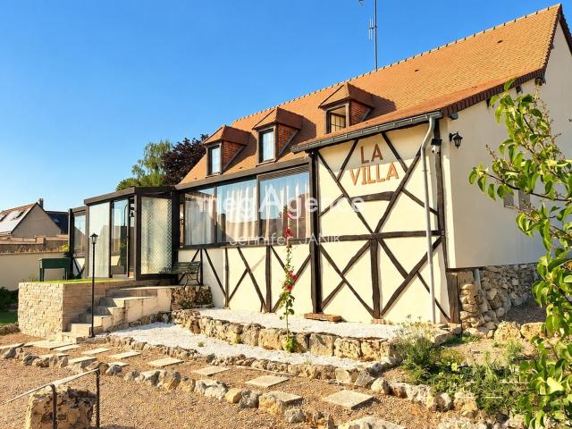 Maison 9 pièces 270 m²