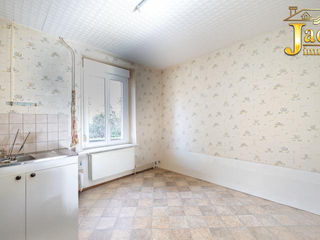 MAISON COMPRENANT 2 LOGEMENTS