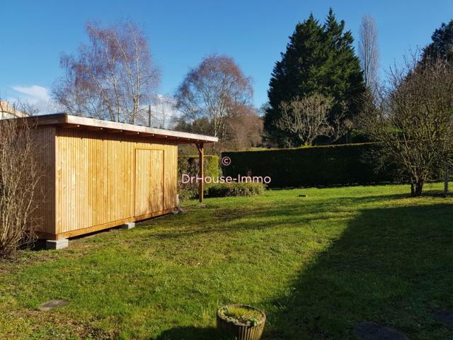 Maison contemporaine de plain pied avec jardin arboré et potentiel d'agrandissement