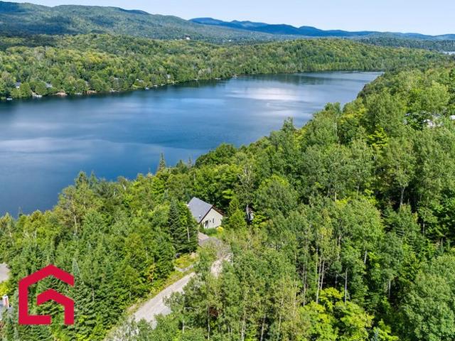 Maison à Louer 25,Rue des Campanules, Sainte Marguerite du Lac Masson 40 photos | Logis Québec