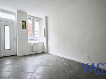 Maison ancienne rénovée dans un quartier dynamique