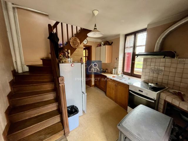 Maison avec terrain non attenant