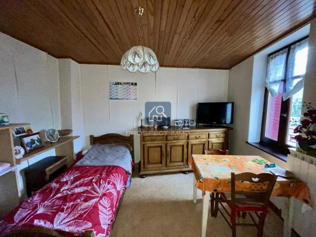 Maison avec terrain non attenant