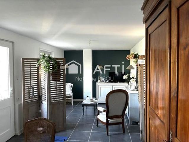 Maison avec vie de plain pied, jardin et garage