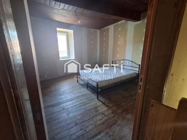Maison avec beau potentiel au calme