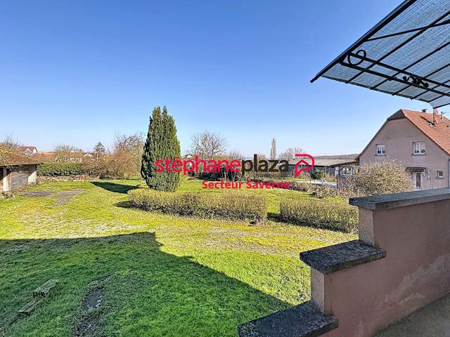 Maison avec grand terrain constructible