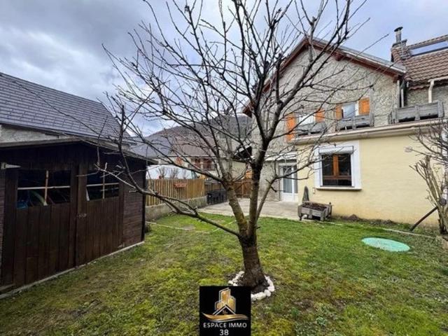 Maison avec jardin attenant