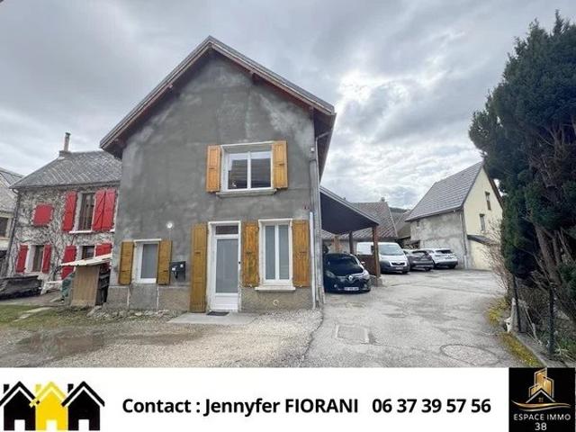 Maison avec jardin attenant