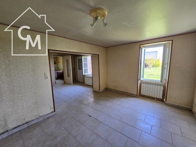 Maison avec grand jardin et double garage