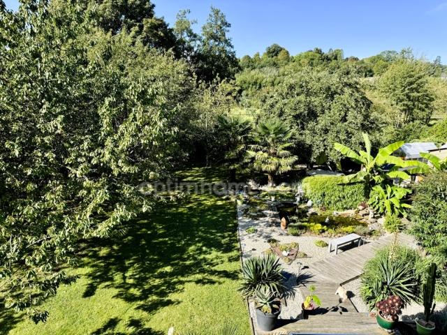 Maison bourgeoise 6 chambres – 216 m² – Jardin arboré, garage et prestations de qualité