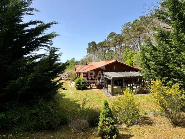 Maison Bois,alliant cachet et sérénité, à Neuvic