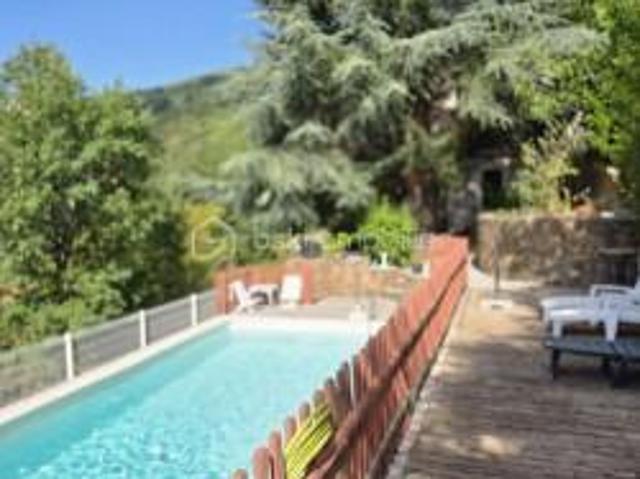 Maison d'architecte atypique 6 pièces sur un terrain de 2000 m2, piscine, 2 garages, vue dominante sur les Cévennes