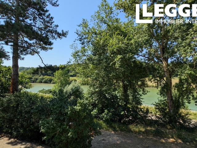 Maison de campagne avec magnifique vue sur un lac et 1 hectare de terrain
