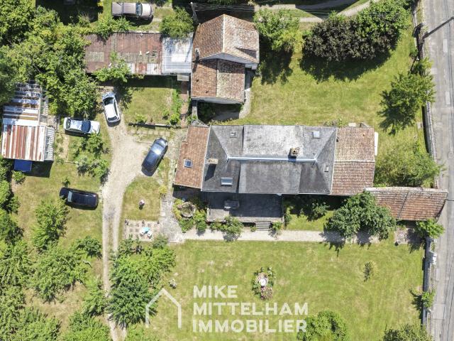 MAISON DE CARACTÈRE AVEC SECONDE MAISON FORT POTENTIEL DANS UN BEL ENVIRONNEMENT