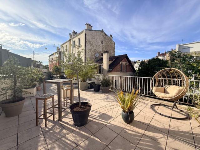 Maison de caractère avec roof top exceptionnel à Asnières sur Seine