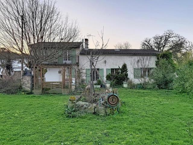 Maison de caractère avec un grand terrain
