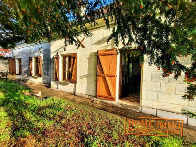 Maison de caractère de 110m² en pierre de taille avec garage et parc de 3000m²