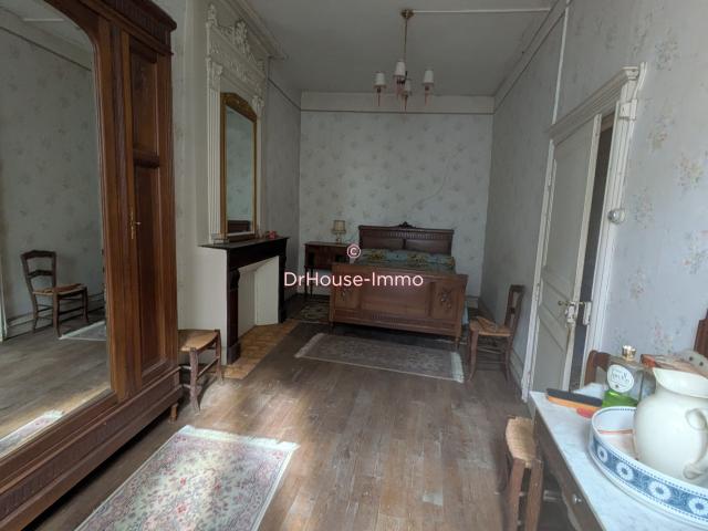 Maison de bourg en pierre avec garage